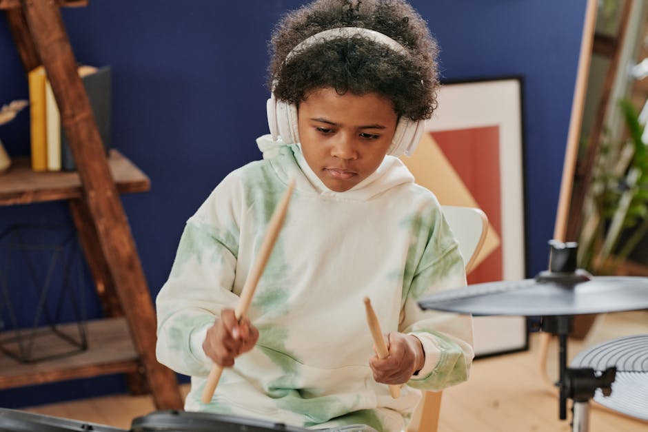 Learner listening to rhythm with headphones