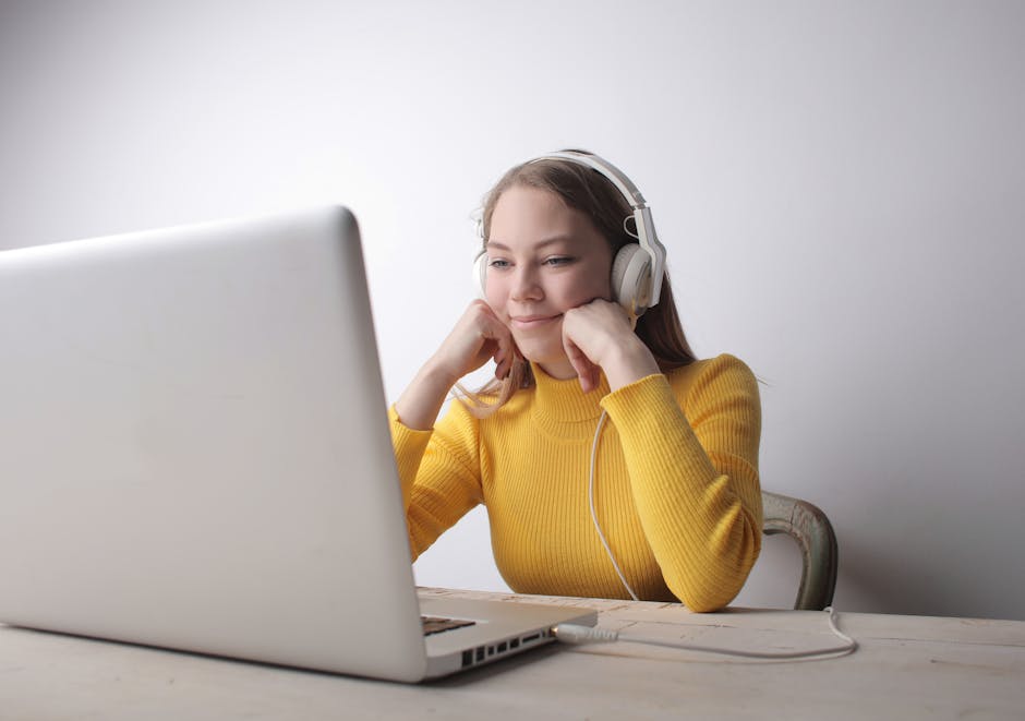 Adult learner practising pronunciation with headphones